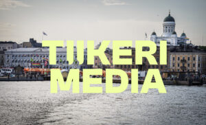 Tiikeri Median logo Helsingin merenrantamaisemassa